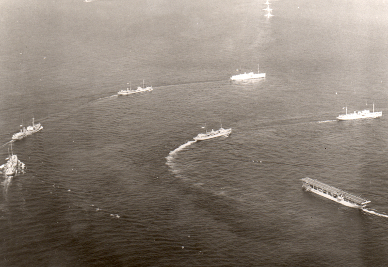 Langley and support ships are practicing a hard turn during one of the United States Navies “Fleet Problems Exercise”